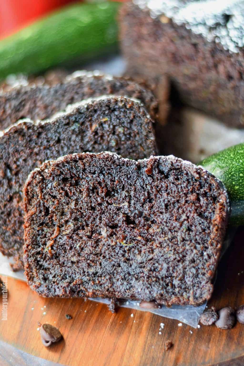 chocolate zucchini bread stacked on a cutting board