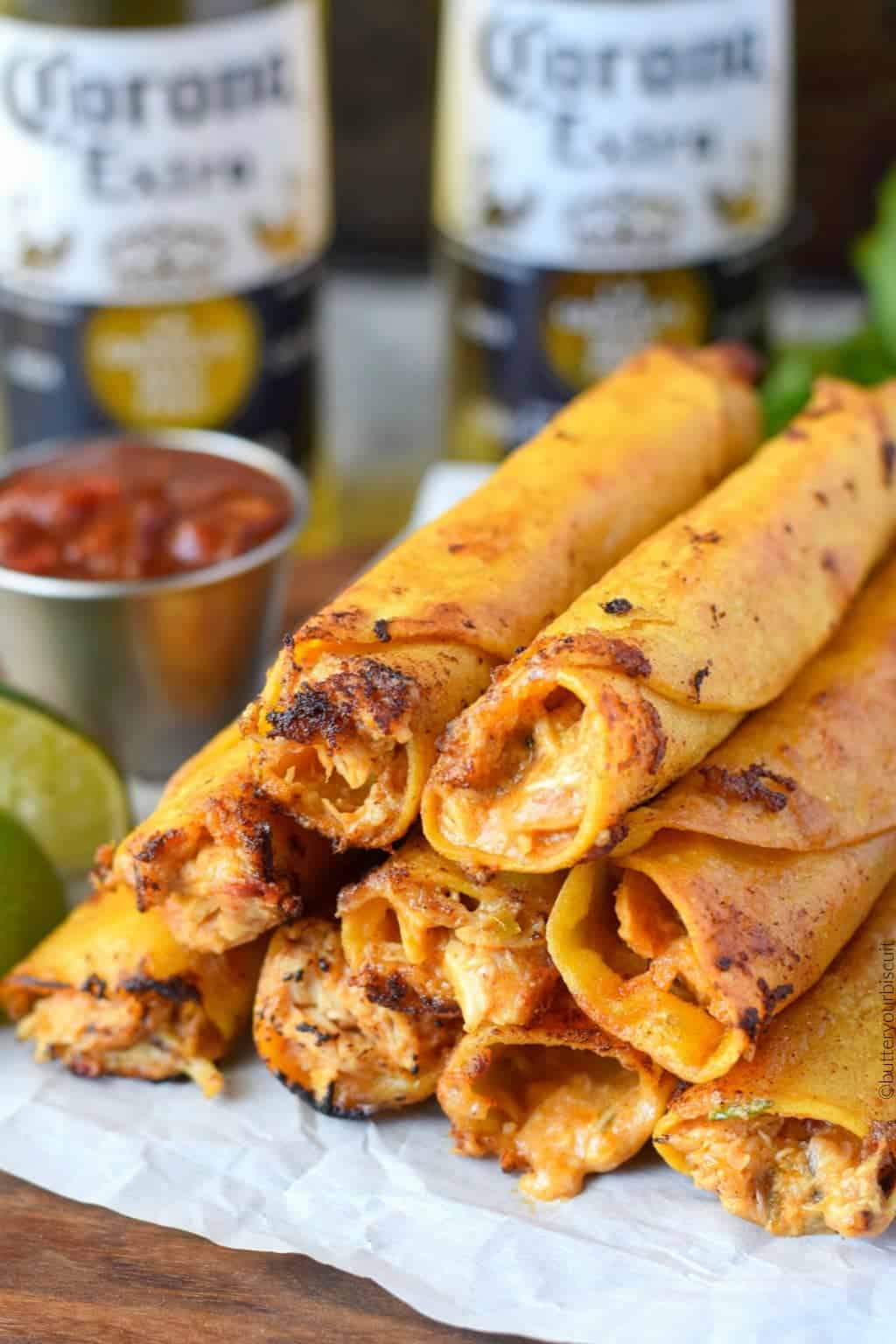 A pile of chicken taquitos.