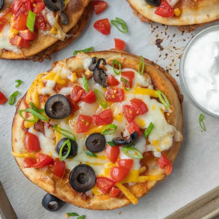 Mexican pizza on a baking sheet.