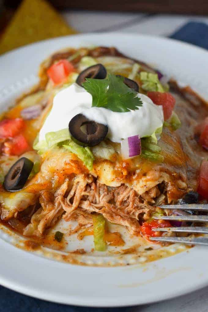 Slow Cooker Smothered Chicken Burritos - Butter Your Biscuit