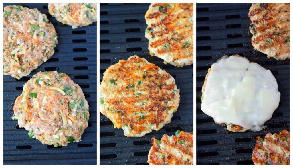 Chicken burgers cooked on a grill.