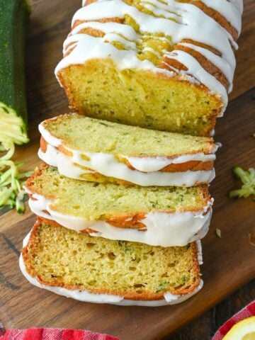 Lemon zucchini bread cut into slices.