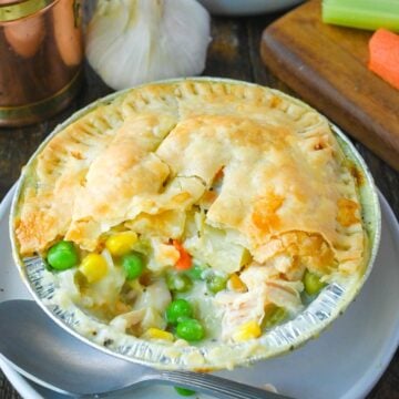 Chicken pot pie with a bite out of it.