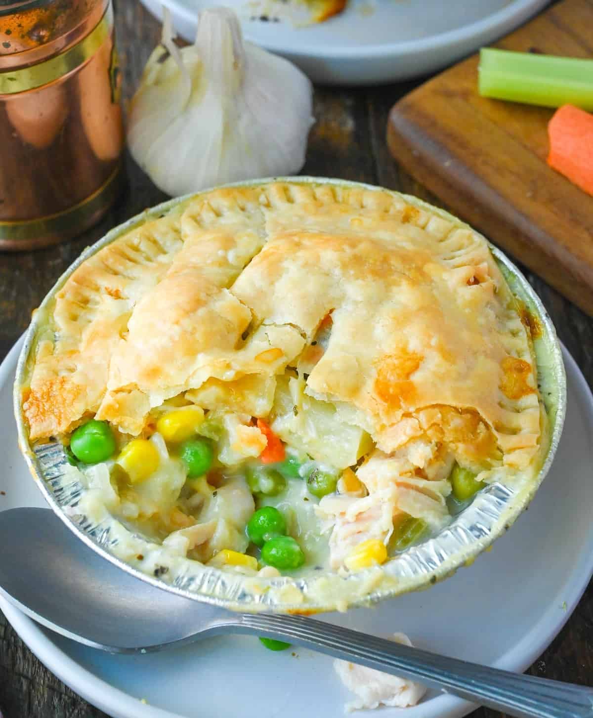 Chicken pot pie with a bite out of it.