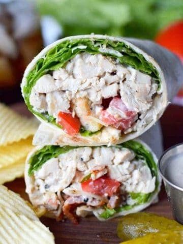 Chicken caesar salad wrap stacked up on top of each other