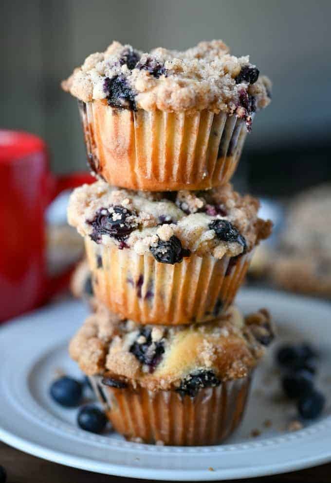Blueberry muffins stacked up.