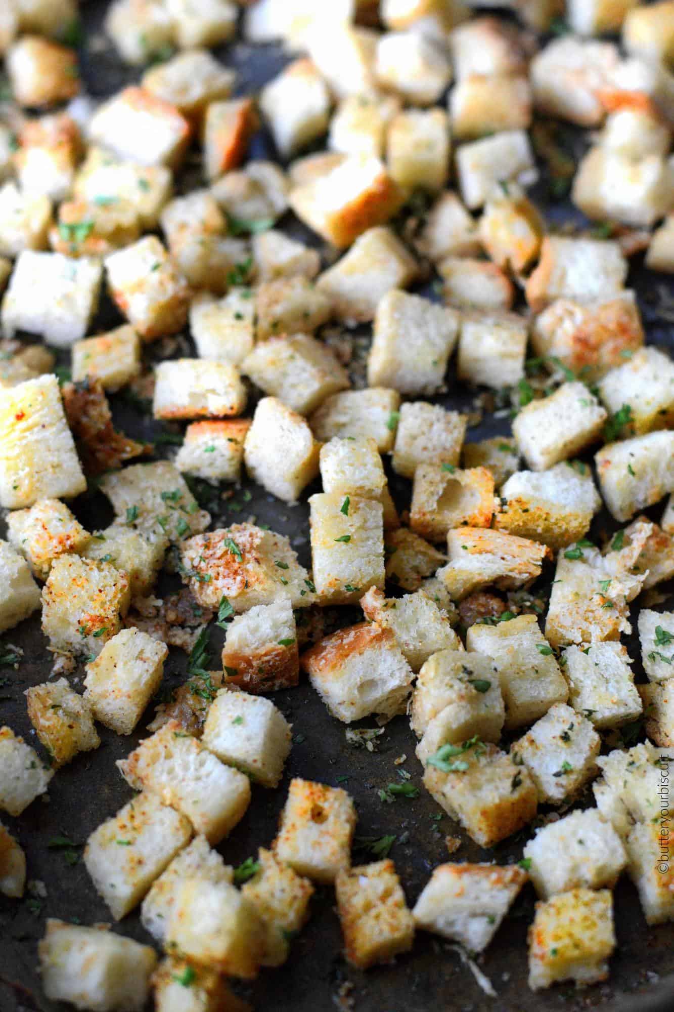 Baked croutons on a baking sheet.