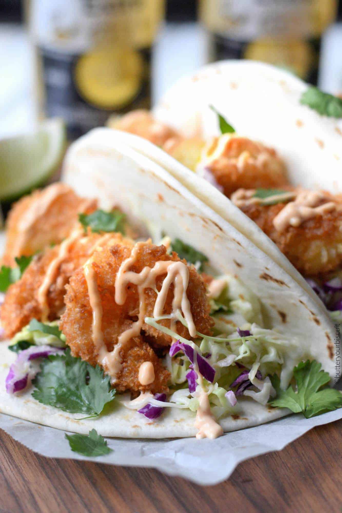 A close up of a plate of food, with Shrimp and Taco