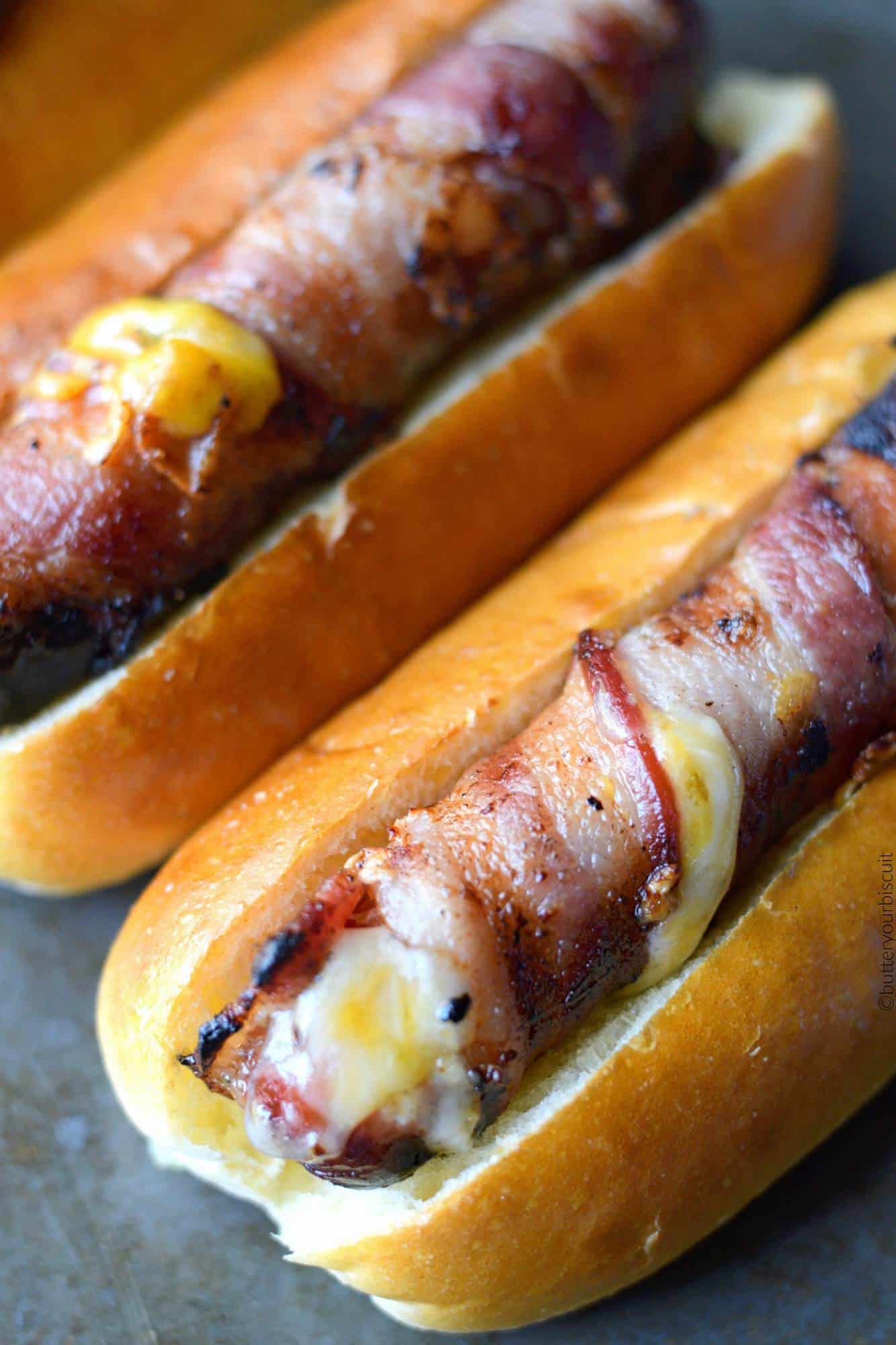 Bacon wrapped cheese stuffed hot dogs