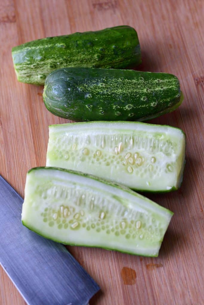 Kirby cuccumbers that have been sliced and ready to place into the brine.