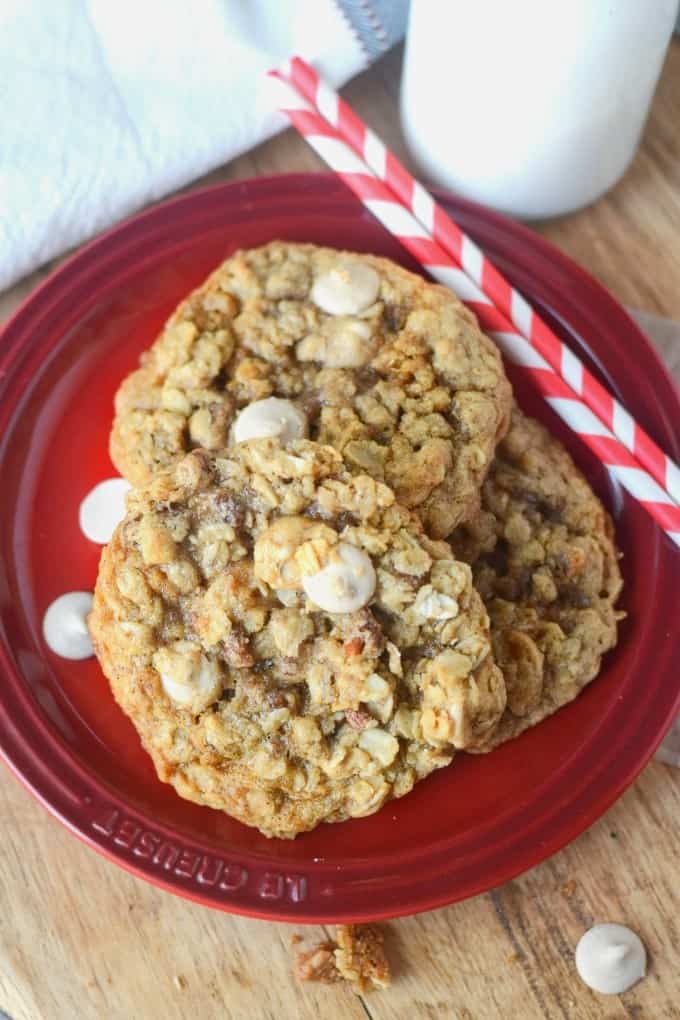 Caramel oatmeal cookies on a red plate.