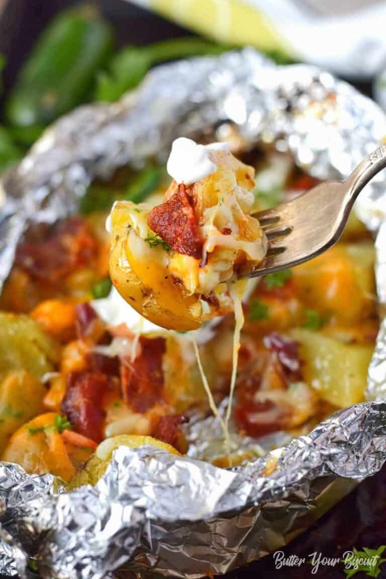 Bacon ranch potatoes being picked up with a fork.