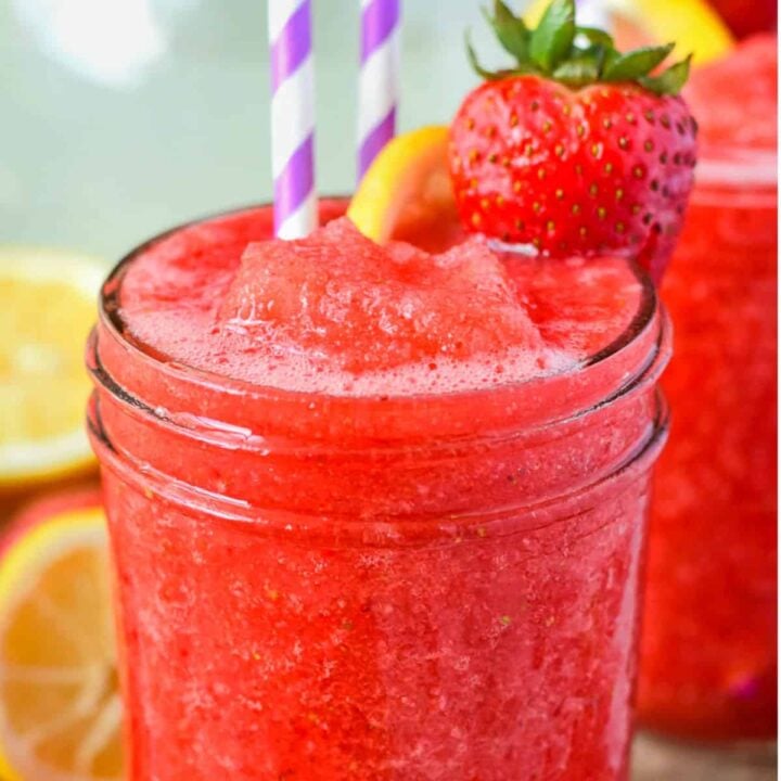 Strawberry vodka slush in a mason jar.