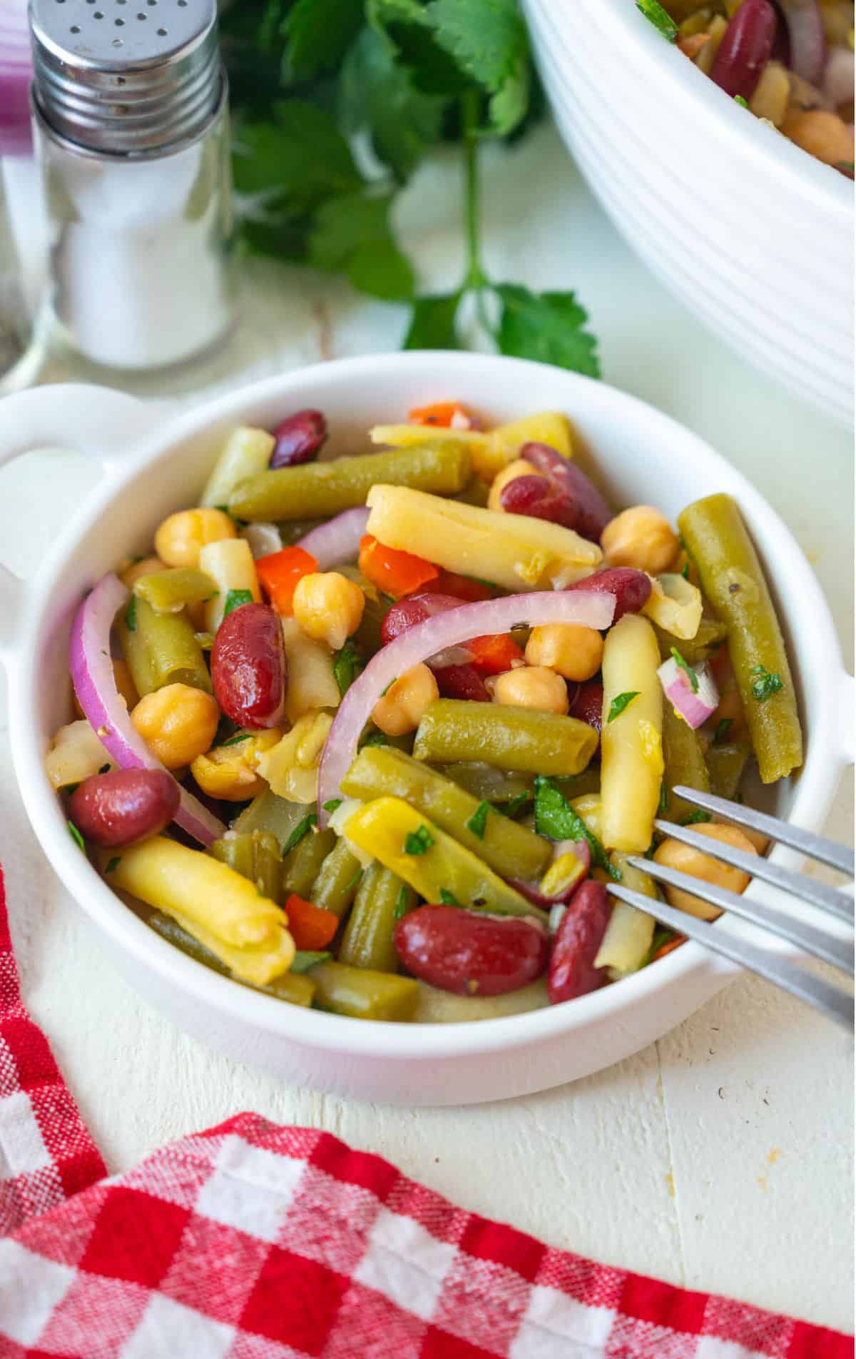 A serving of bean salad in a small bowl.