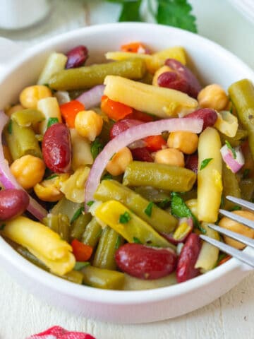 A serving of bean salad in a small bowl.