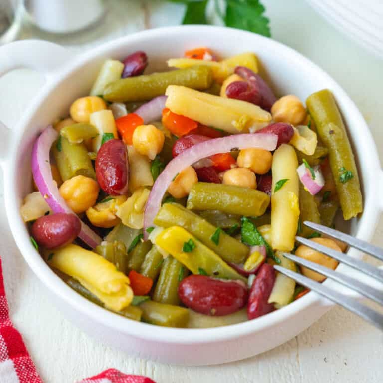 A serving of bean salad in a small bowl.