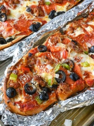 Close up of french bread pizza cooked on the grill.