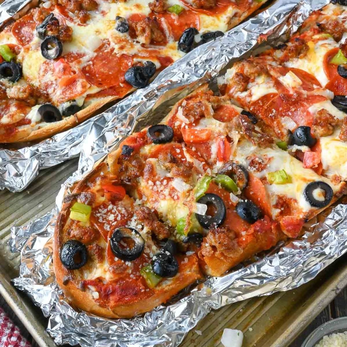 Close up of french bread pizza cooked on the grill.