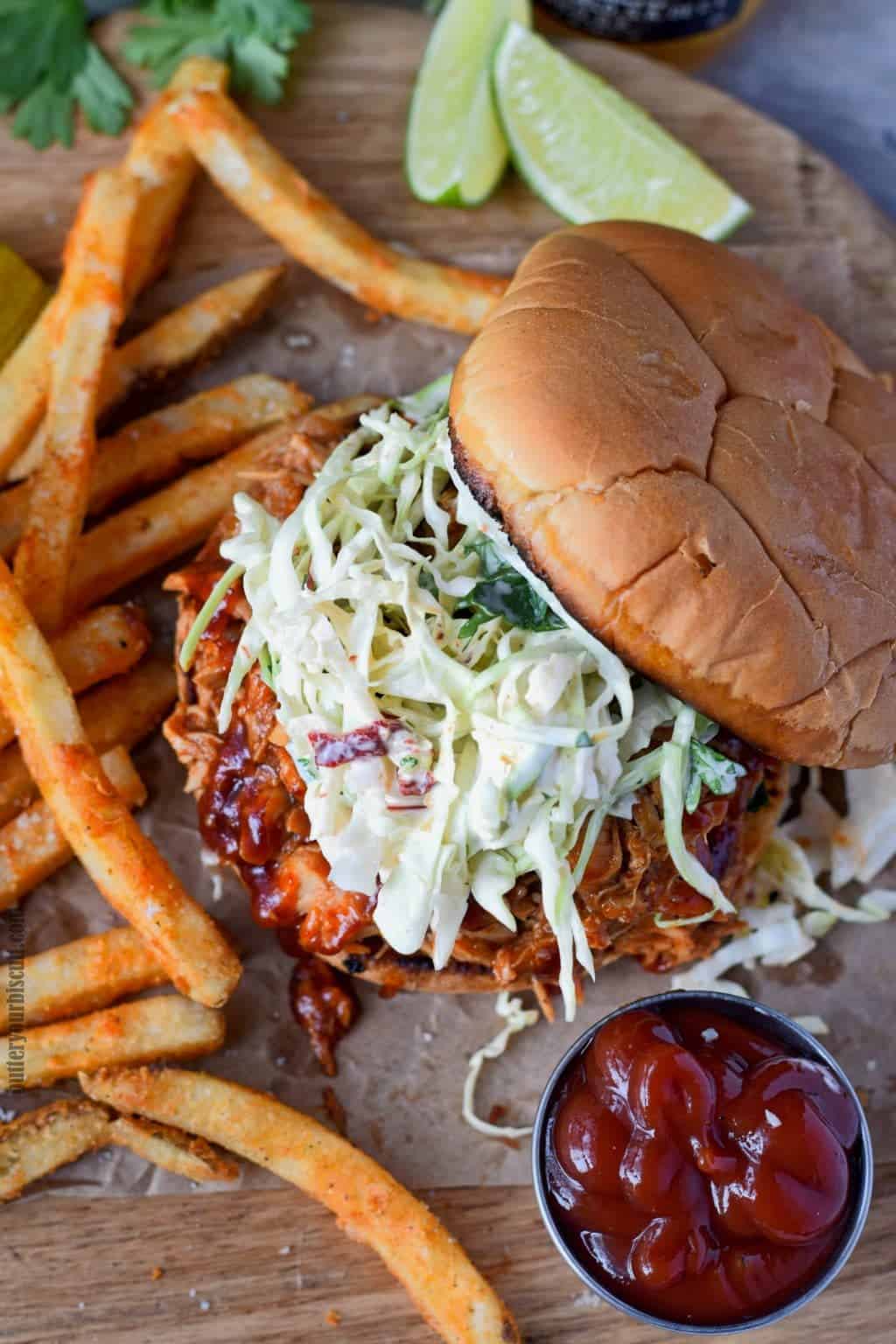 Slow Cooker BBQ Chicken Sandwich Recipe - Butter Your Biscuit