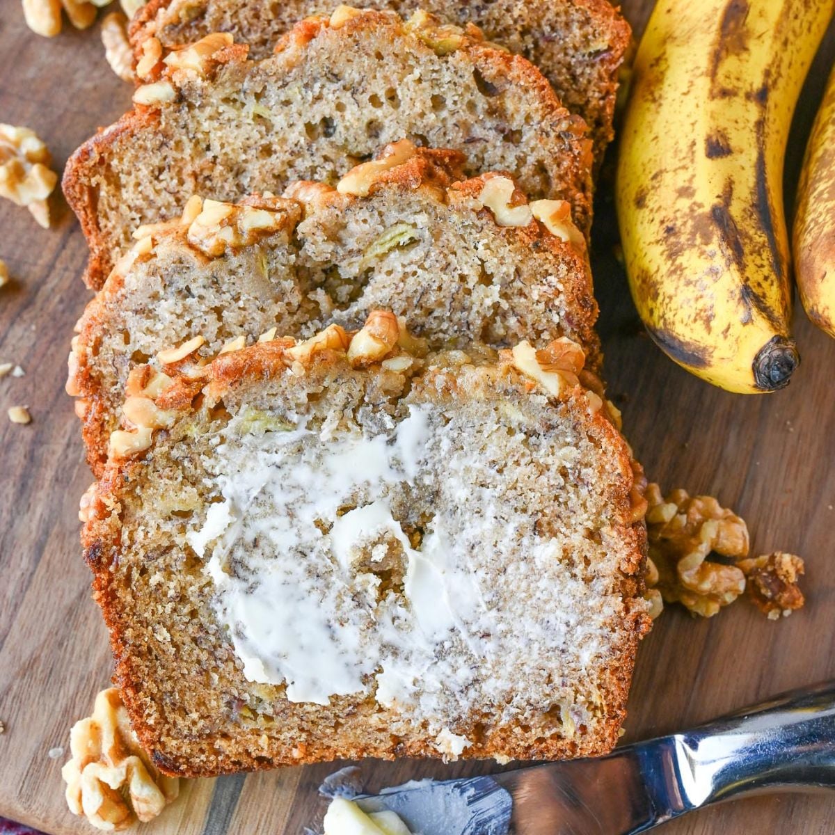 Starbucks banana bread with butter on a slice.