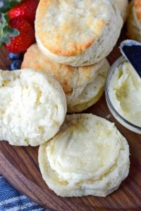 buttermilk biscuits with on sliced and honey butter