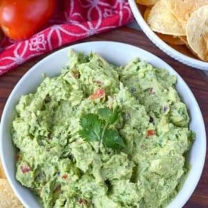 Guacamole in a white bowl.