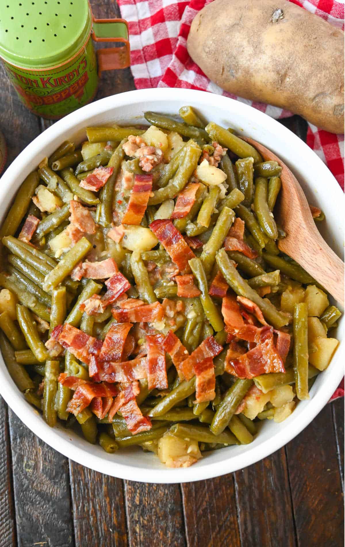 Slow cooker southern green beans in a white bowl.
