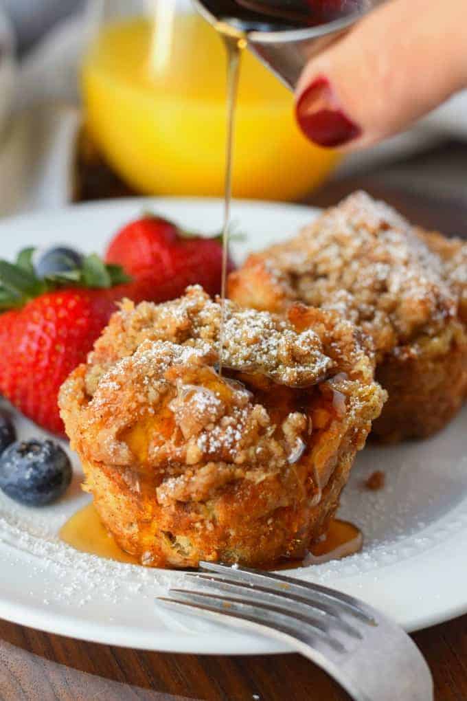 French toast muffin with syrup being poured on top.