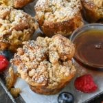 French toast muffins with a side of syrup.