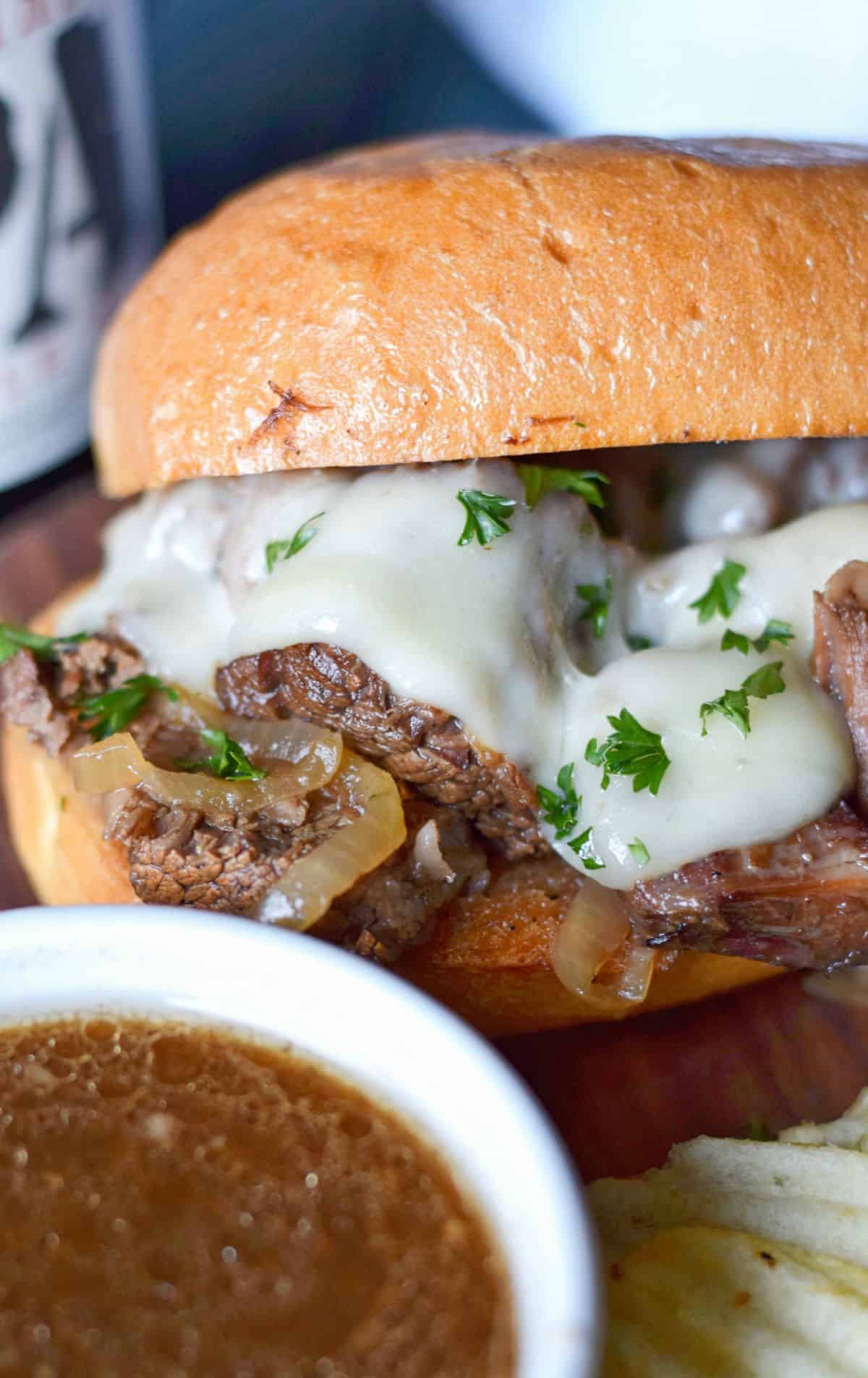 French dip sandwich with a side of au jus.