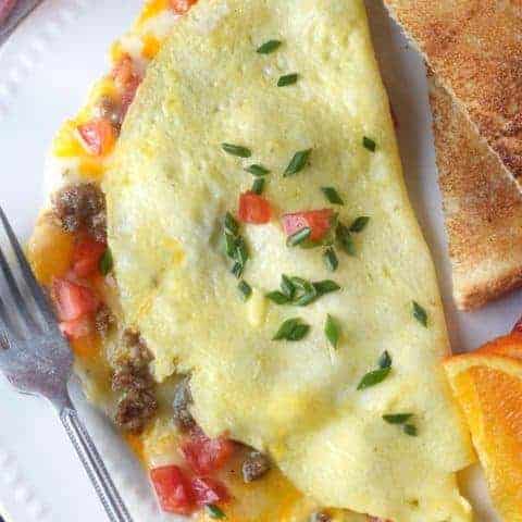 An omelet, with Cheese and Sausage