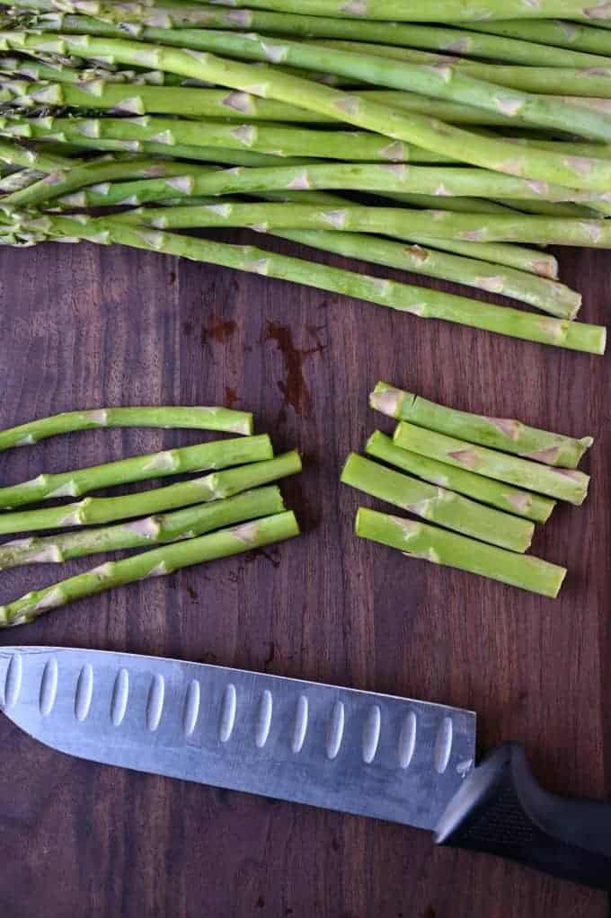 Asparagus on a cutting board.