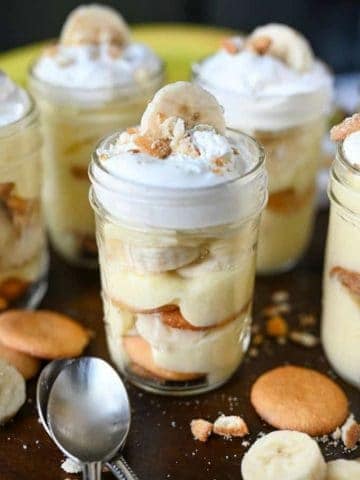 Pudding layered with bananas in a slass.