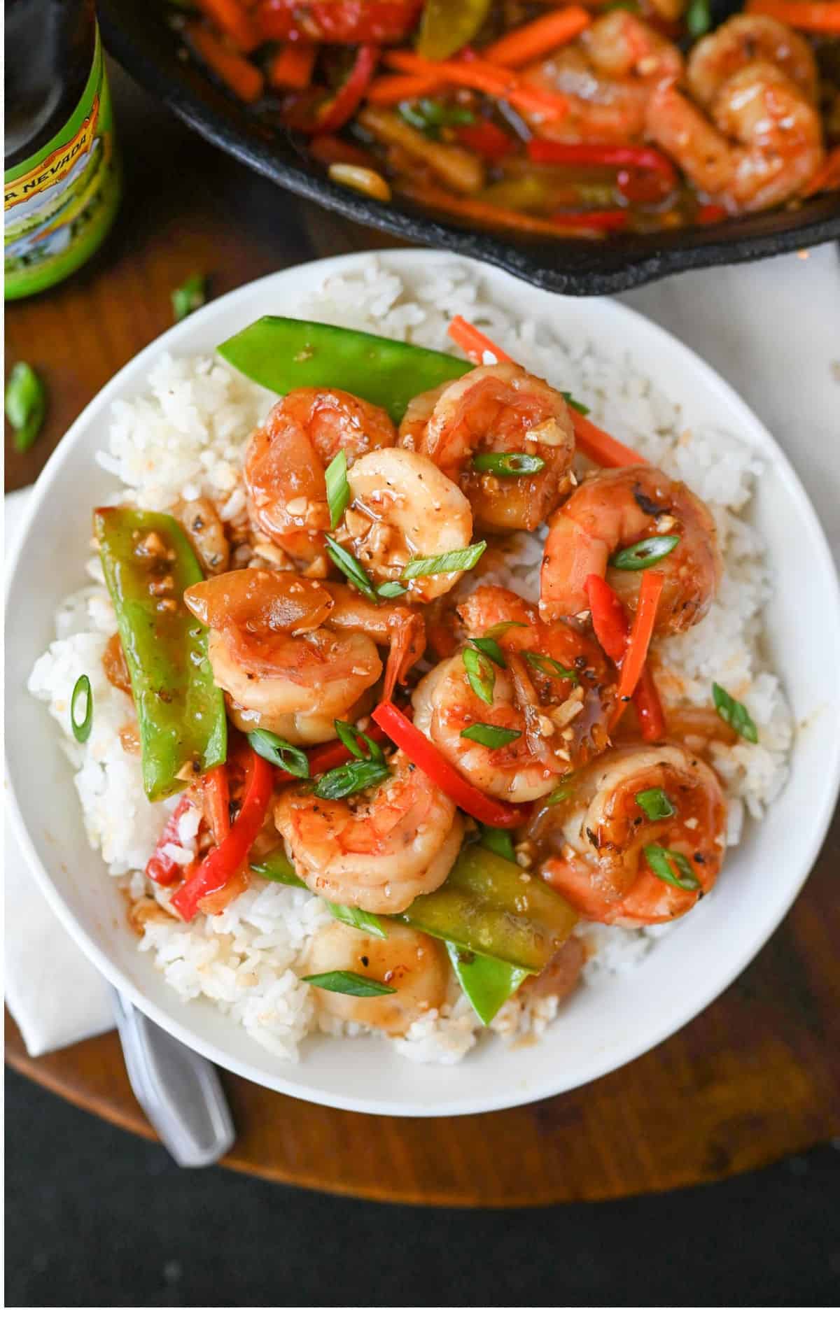 Shrimp and veggies over rice.