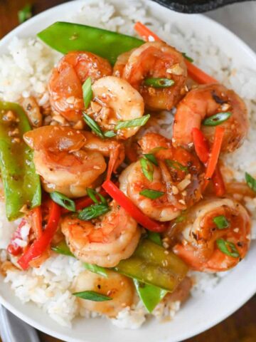 Shrimp and veggies over rice.