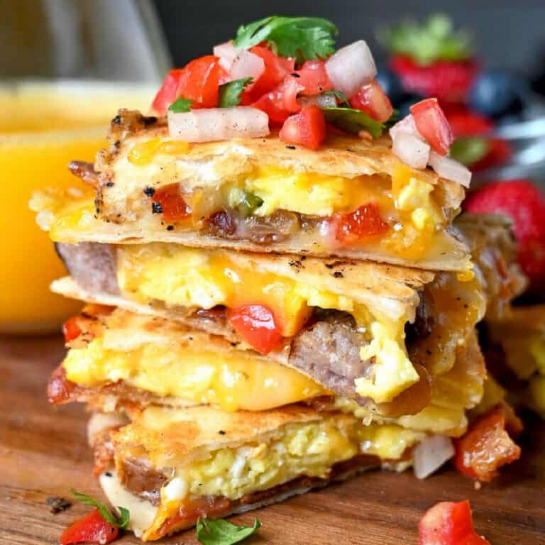 Breakfast quesadillas stacked on top of each other.