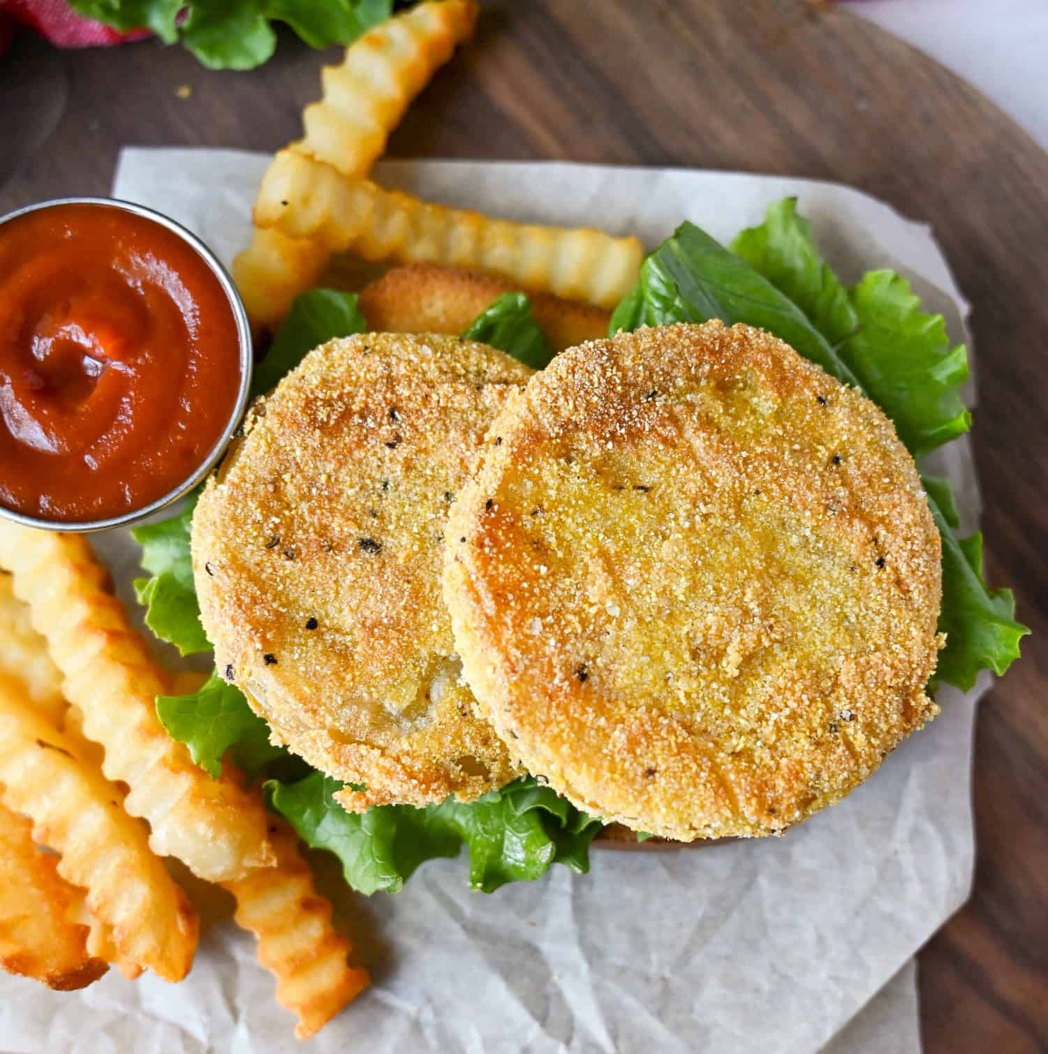 Fried green tomatoes on lettuce.