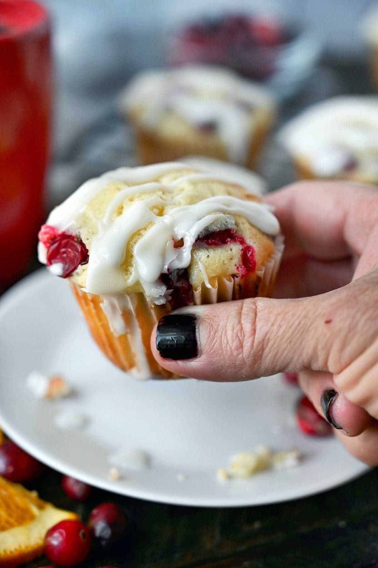 Muffin being held in a hand.