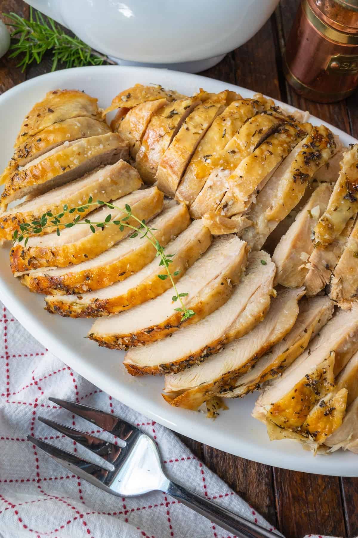 Sliced slow cooker turkey on a platter