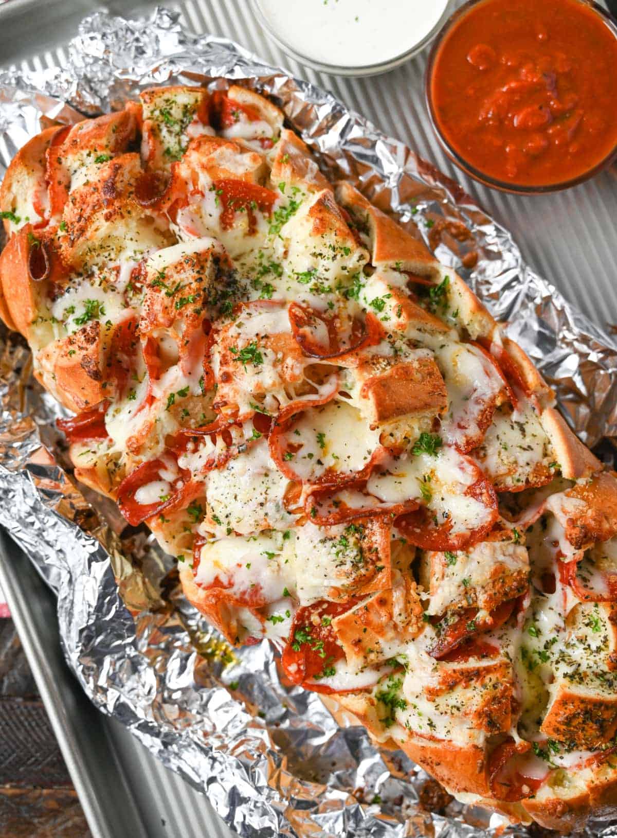 Pepperoni pull apart bread unwrapped but setting in foil.