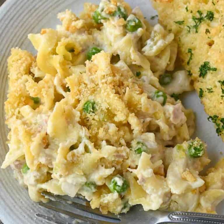 Tuna casserole on a plate with a fork.