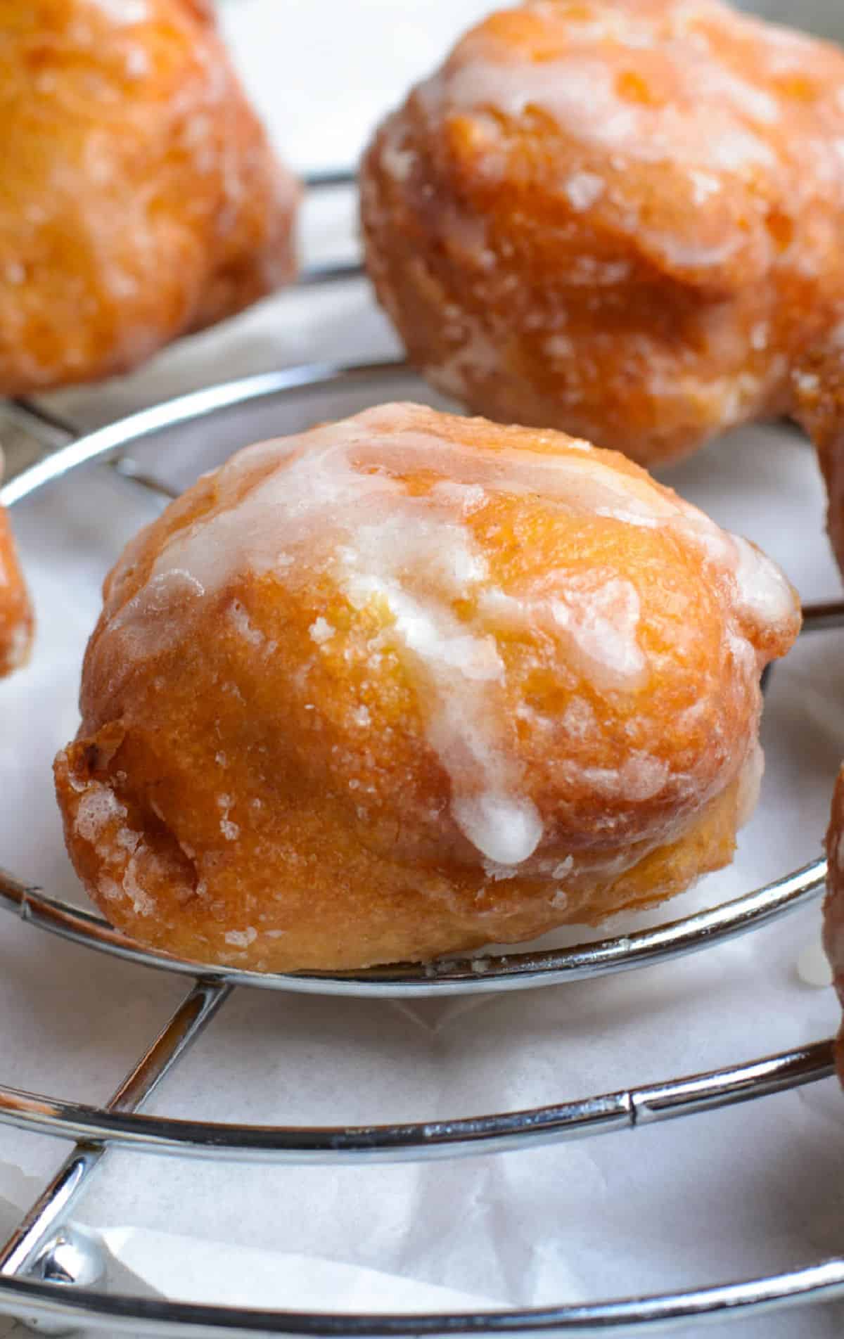 Banana fritter placed on a rack.