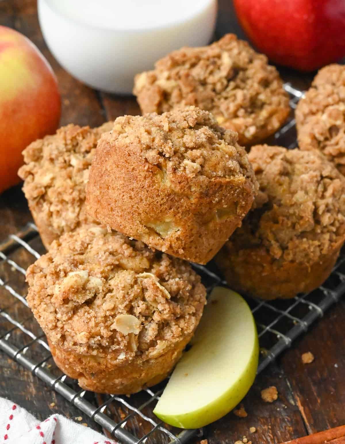 Apple spice muffins on a cooling rack.