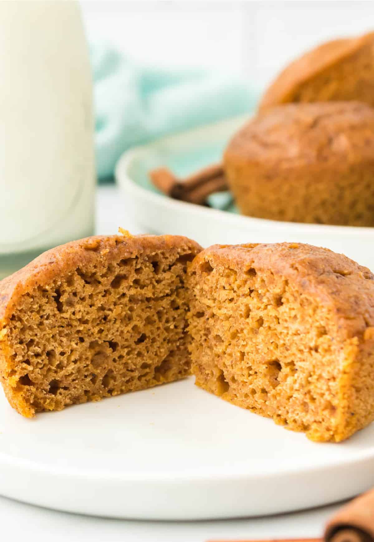 A pumpkin muffin cut in half.