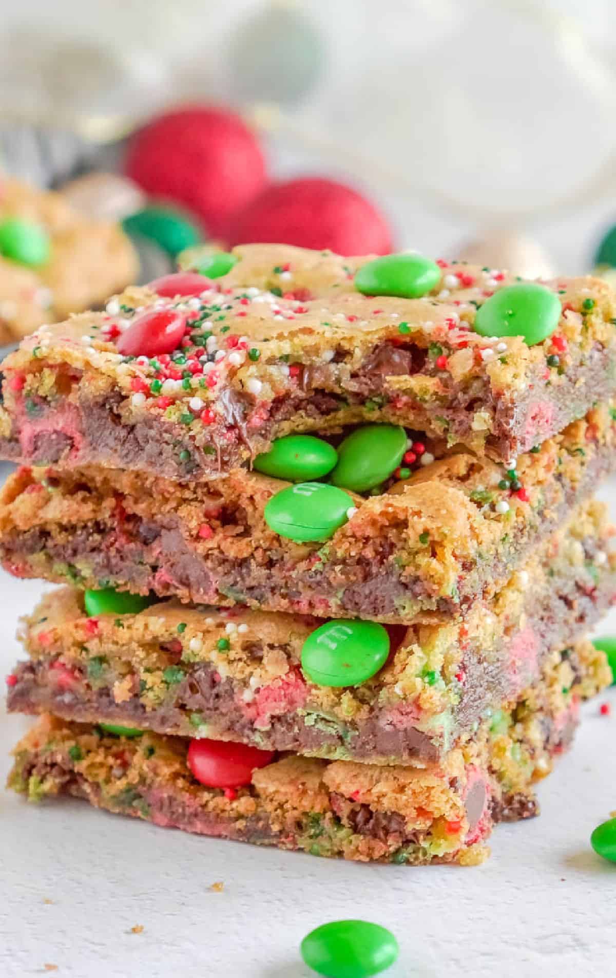 A stack of four Christmas cookie bars.