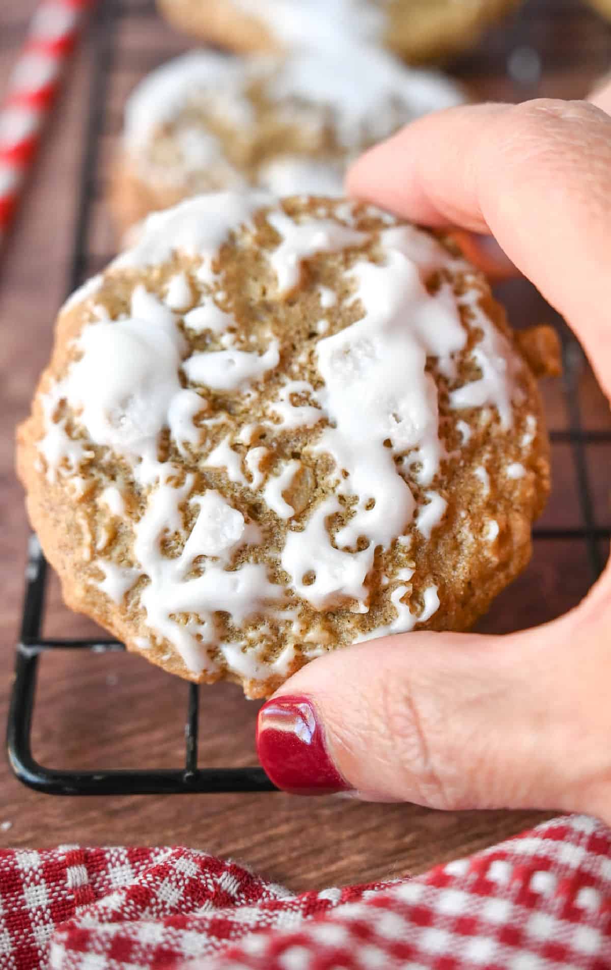 oatmeal cookie being picked up.