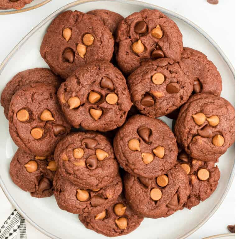 A close up photo of cookies on a white plate.