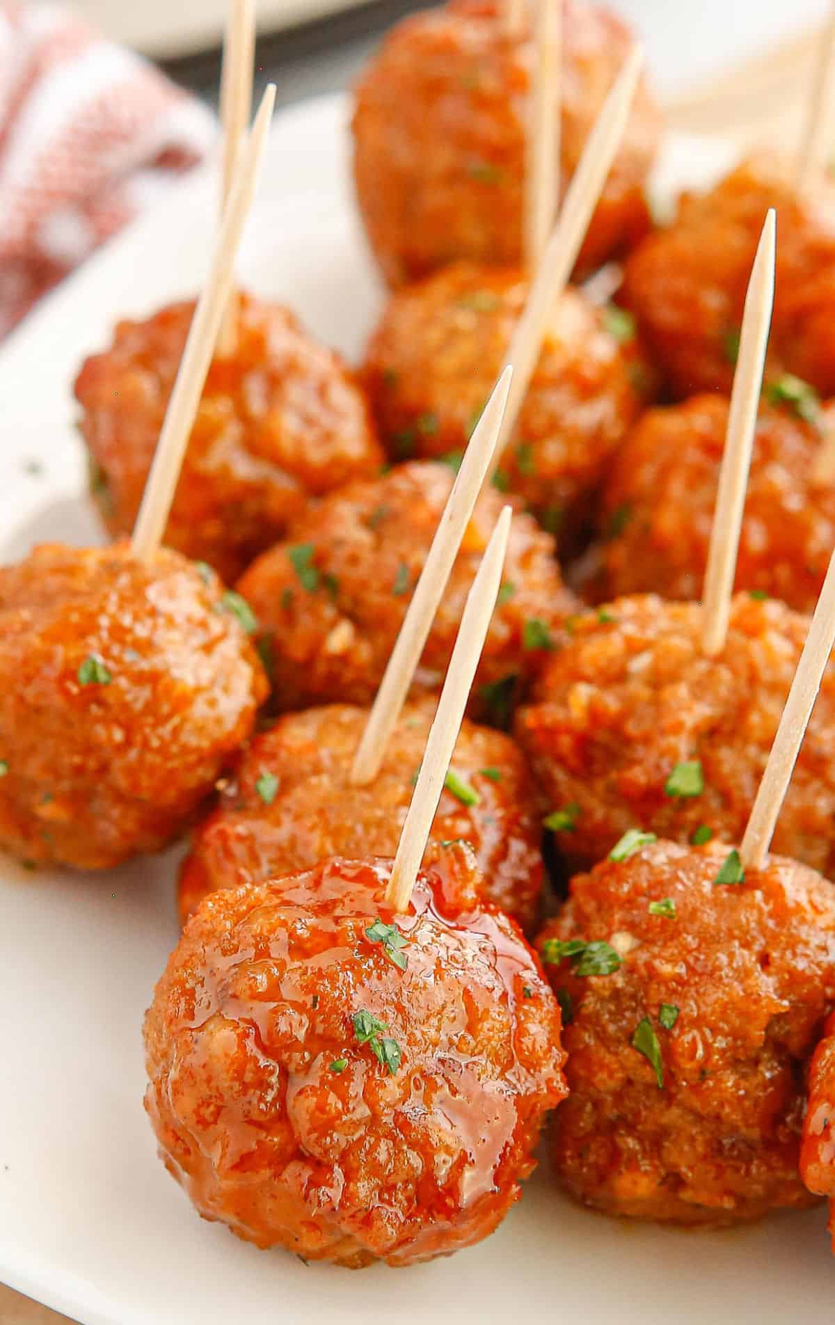 A close up photo of meatballs.