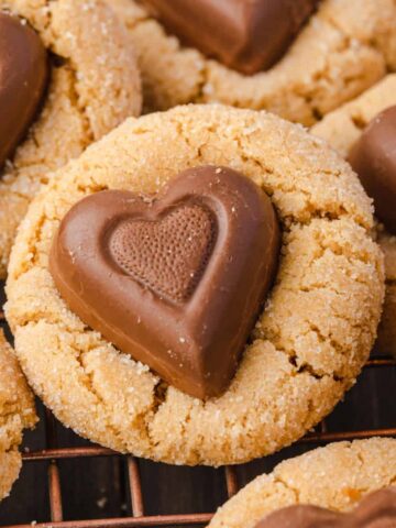 Close up photo of peanut butter heart cookie.