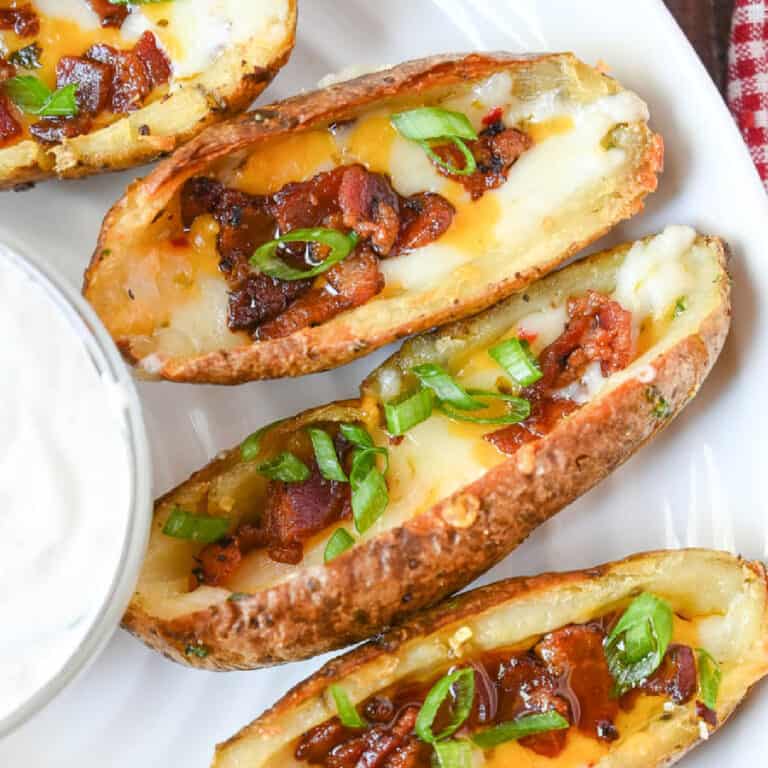 Potato skins on a plate.